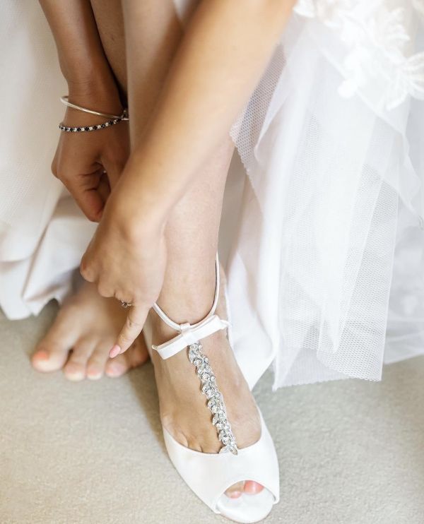 Real bride Sabrah wearing Phoenix Sandals