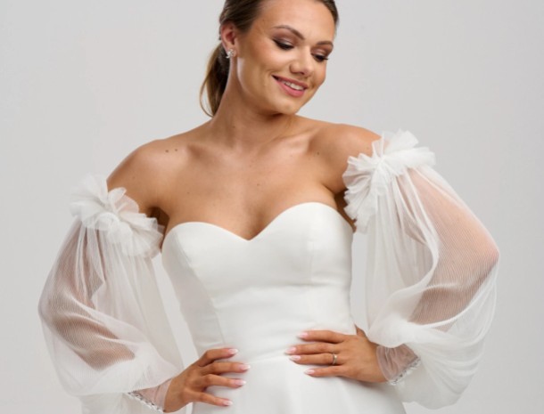 Mangas de un vestido de novia color marfil