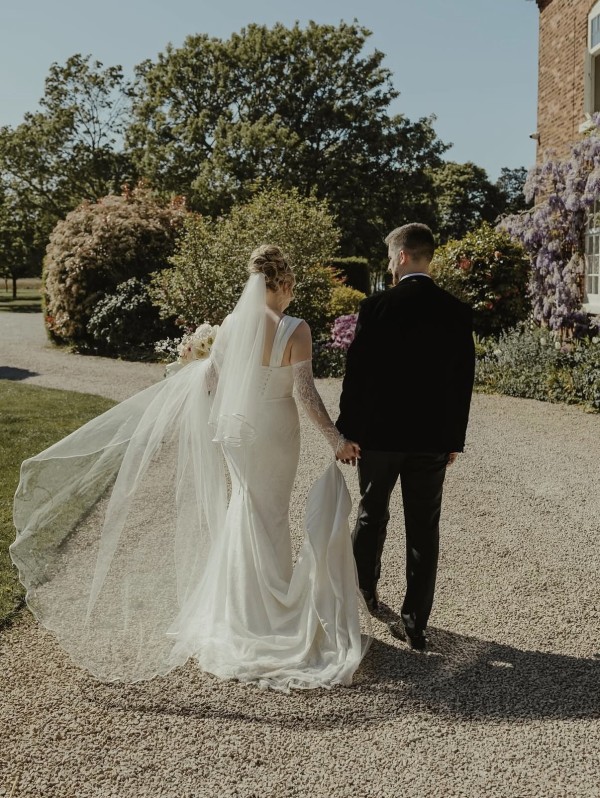Photo of Bianco Ivory Two Tier Satin Edge Chapel Veil S208 uploaded by C on 27th July 2026