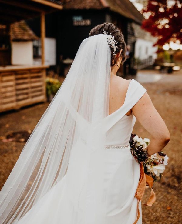 Photo of Anemone Ivory Porcelain Flowers and Pearl Wedding Hair Comb (Silver) uploaded by K on 11th January 2023