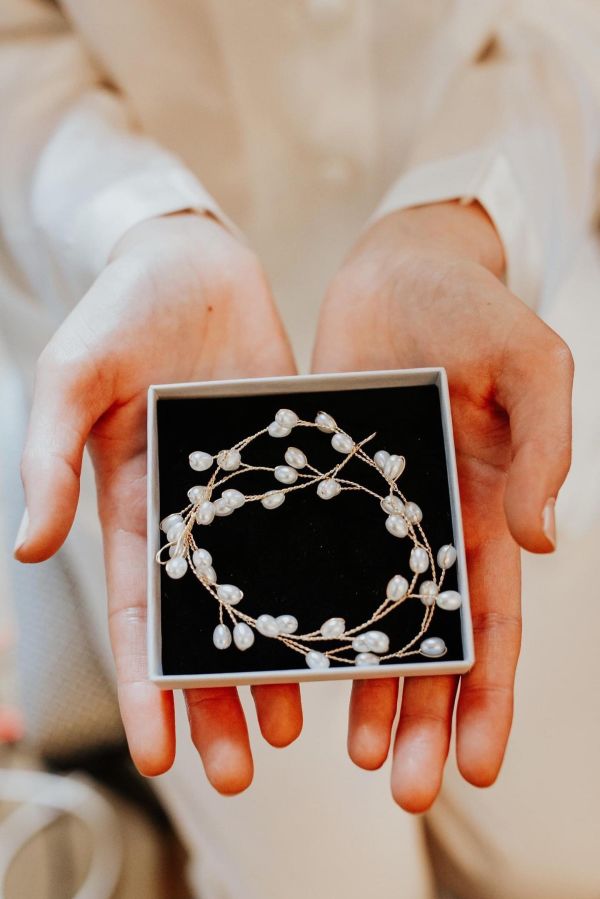 Photo of Aruba Long Delicate Pearl Wedding Hair Vine (Gold) uploaded by L on 8th June 2023