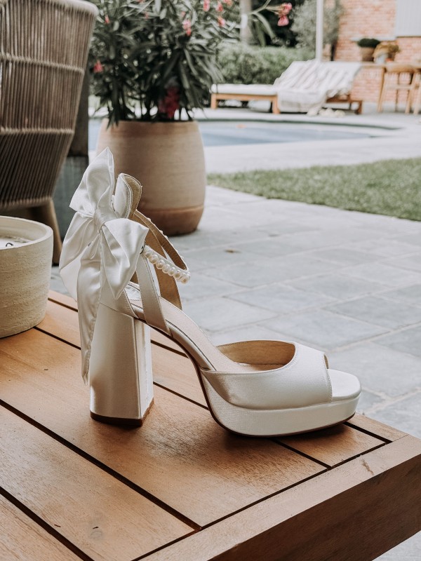 Photo of Perfect Bridal Camden Dyeable Ivory Satin Block Heel Platform Sandals with Oversized Bow uploaded by SB on 7th August 2025