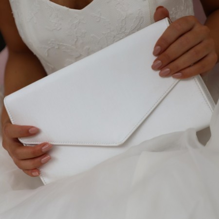 plain white clutch bag