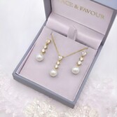 Photograph: Celine Gold Triple Crystal and Pearl Drop Jewelry Set