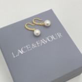 Photograph: Chloe Gold Dainty Pearl Drop Wedding Earrings