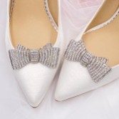 Fotografia: Clipes para sapatos com laço em prata e strass da Tiffany