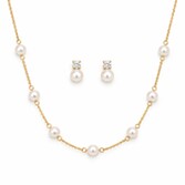 Photograph: Evie Gold Dainty Pearl Earring and Necklace Jewellery Set