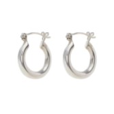 Photograph: Freya Rose Silver Mini Hoop Earrings