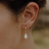 Photograph: Hermione Harbutt Adele Petite Baroque Pearl Hoop Earrings