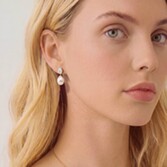 Photograph: Ivory and Co Hampstead Gold Crystal Pearl Drop Earrings