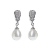 Photograph: Ivory and Co Serrano Pearl Drop Wedding Earrings