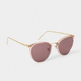 Fotografía: Katie Loxton Gafas de sol Santorini de oro rosa con montura ancha tipo «ojo de gato»