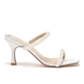 Photograph: Perfect Bridal Mules à talons et lanières en satin ivoire et perles Stacie