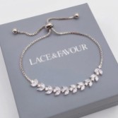 Fotografía: Pulsera ajustable con hojas de cristal plateado y lunares