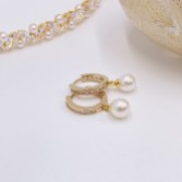 Photograph: Tahiti Gold Pearl Drop Crystal Huggie Hoop Earrings