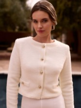 Photograph: Bianco Ivory Knitted Button Down Bridal Jacket E494