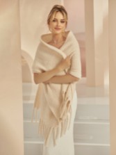 Photograph: Bianco Knitted Wedding Shawl with Tassels E383