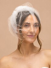 Photograph: Perfect Bridal Ivory Birdcage Veil Fascinator Headband with Pearl Accents