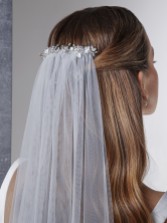 Photograph: Rainbow Club Indigo Embellished Comb Ivory Chapel Veil