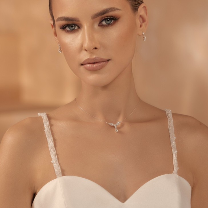 Tirantes desmontables para vestido en color marfil con cuentas y lentejuelas de Bianco