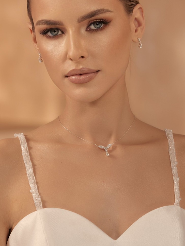 Tirantes desmontables para vestido en color marfil con cuentas y lentejuelas de Bianco