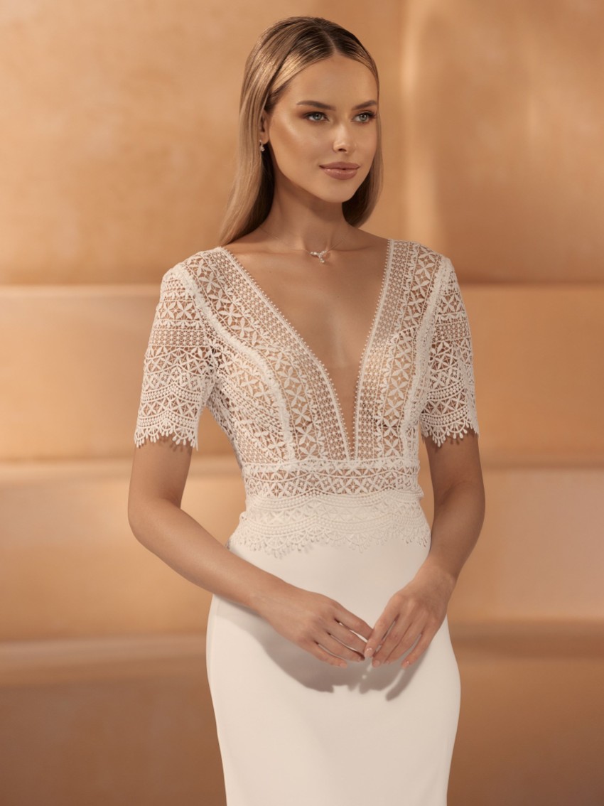 Photograph: Bianco Ivory Boho Lace V Neck Bridal Top E443