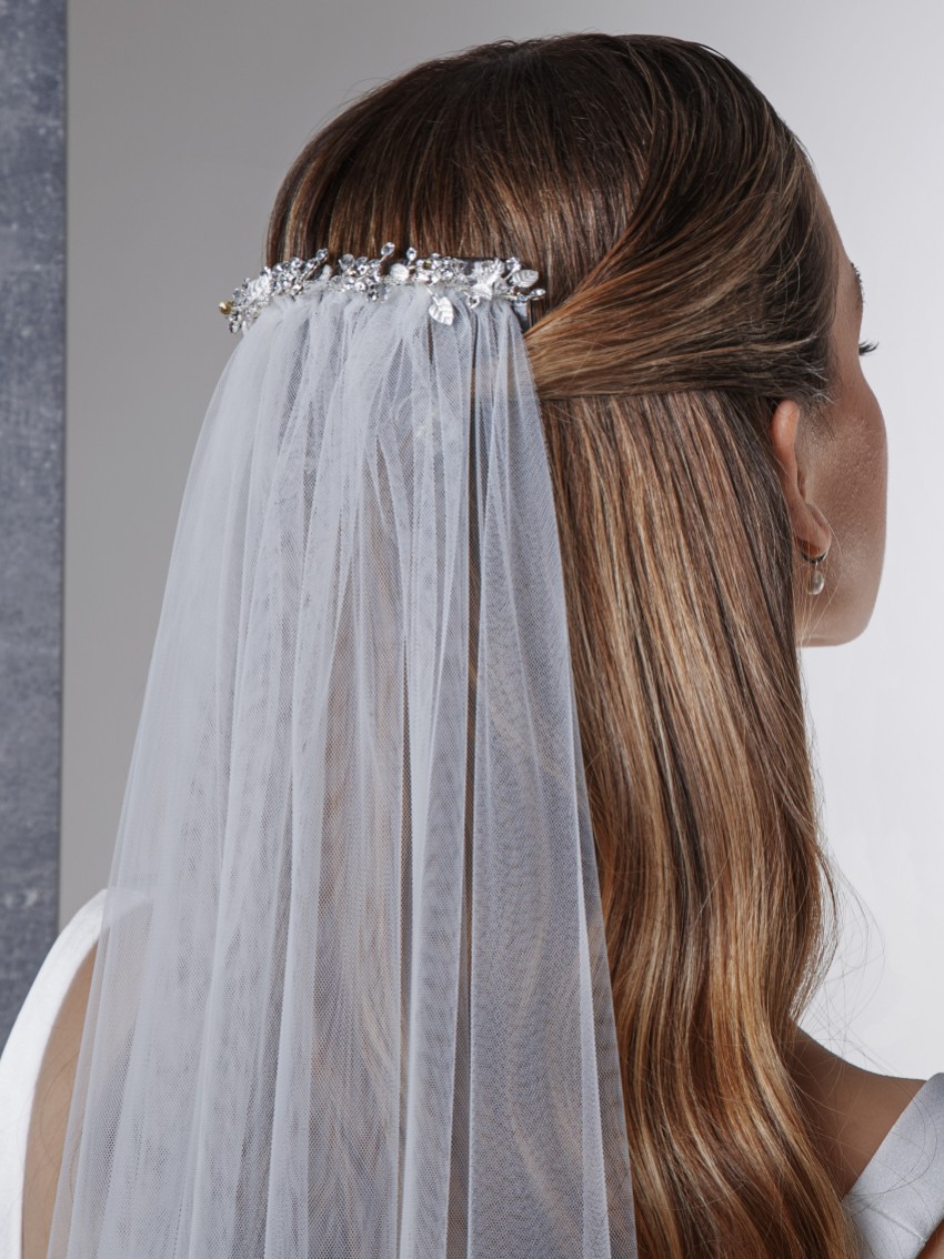 Photograph: Rainbow Club Indigo Embellished Comb Ivory Chapel Veil