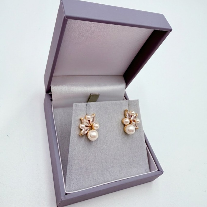 Photograph: Eden Gold Crystal and Cluster Pearl Earrings
