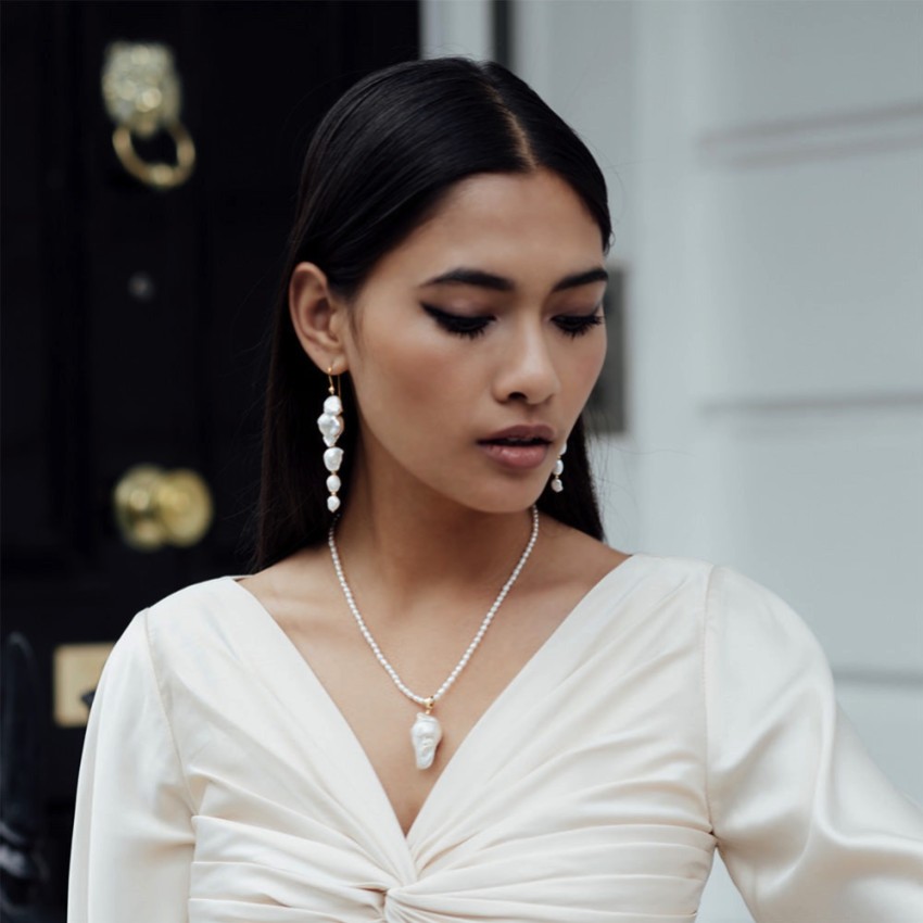 Photograph: Freya Rose Large Baroque Pearl Statement Gold Drop Earrings