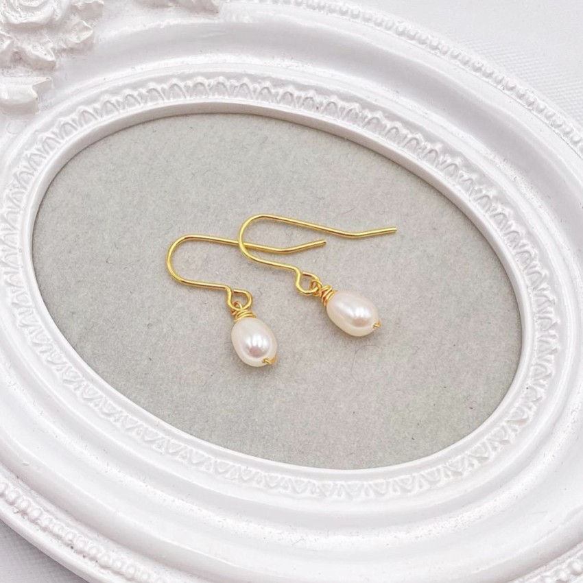 Photograph: Hermione Harbutt Starlight Gold Pearl Drop Earrings