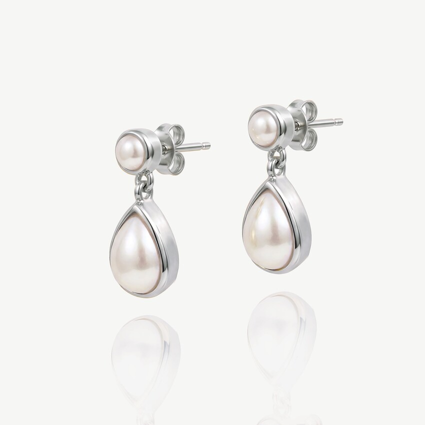 Photograph: Ivory and Co Corsica Pearl Earrings