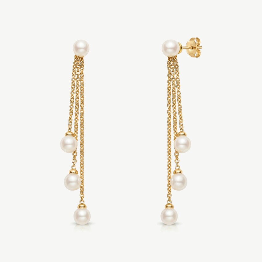 Photograph: Ivory and Co Montreal Gold Mini Pearl Drop Earrings