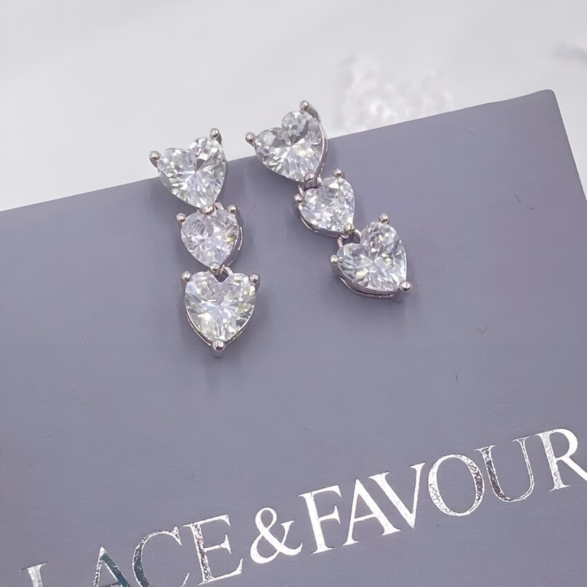 Fotografía: Pendientes de boda «Crystal Hearts» de Langham CZ