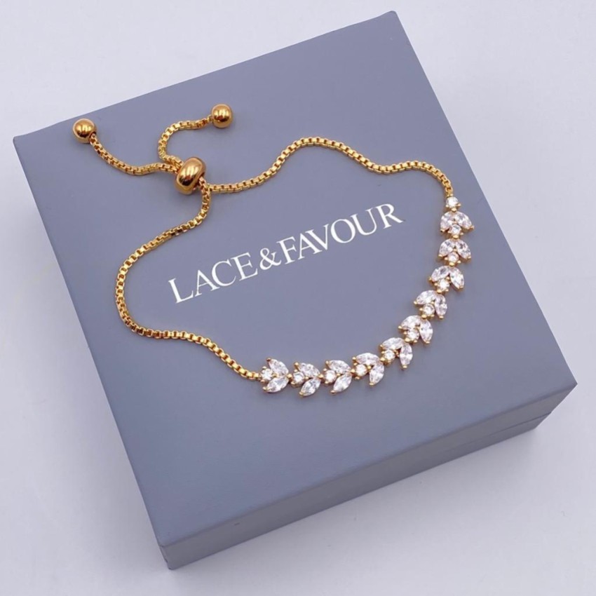 Fotografía: Pulsera ajustable con hojas de cristal doradas y lunares