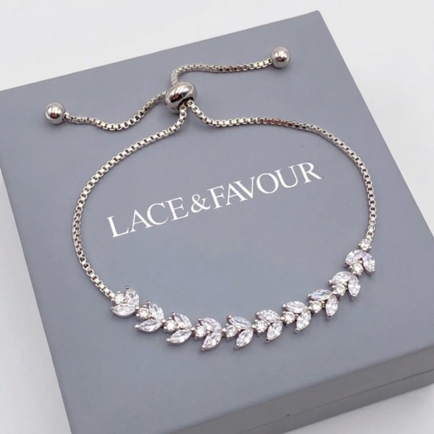 Fotografía: Pulsera ajustable con hojas de cristal plateado y lunares