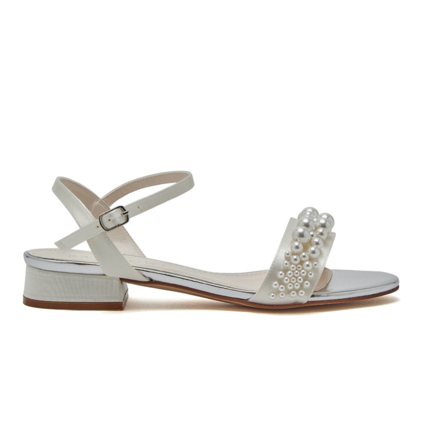Photograph: Rainbow Club Kendall Ivory Satin Pearl Flat Bridal Sandals