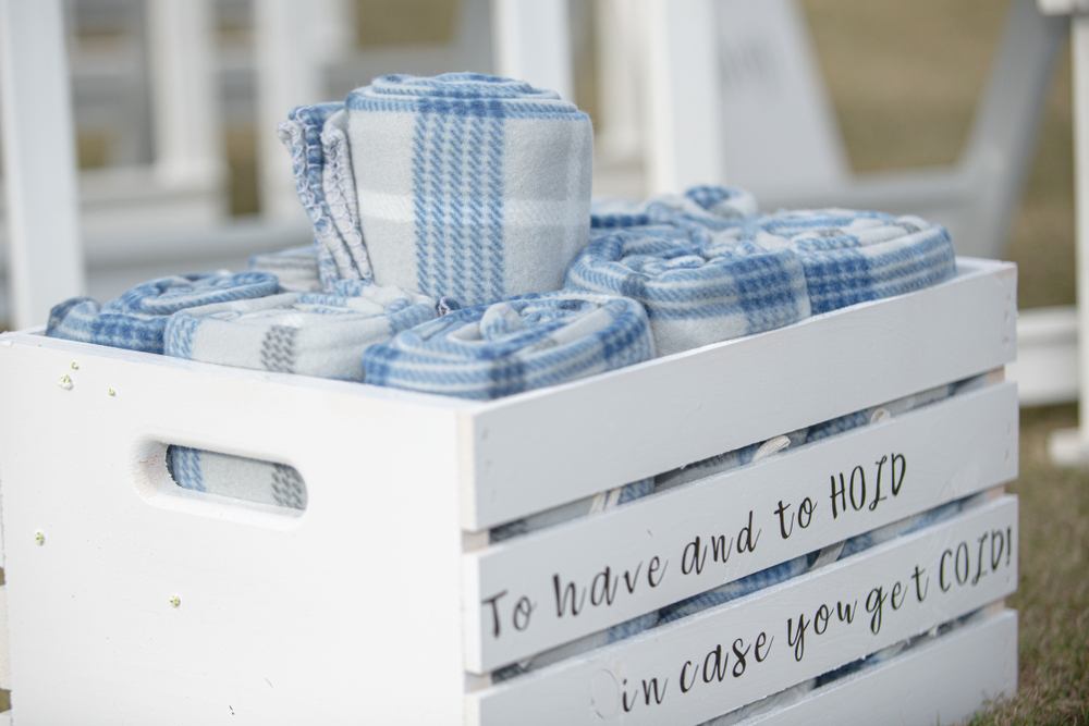 Crate With Blankets For Wedding Guests